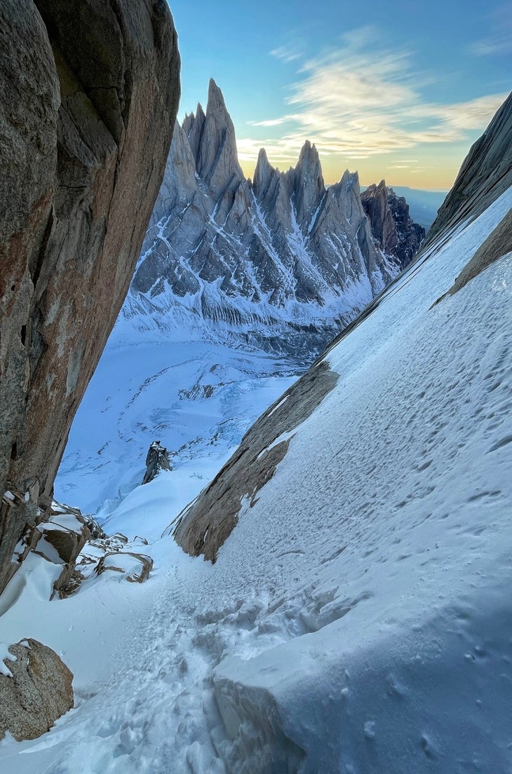 Photo of looking down a snowy couloir in Patagonia, in winter.