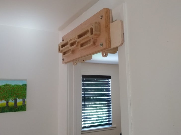 Tension Whetstone mounted in a doorway.